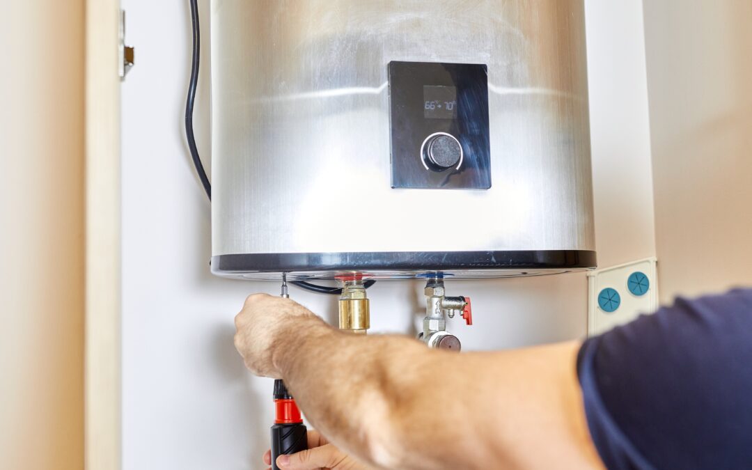 Man fixing a boiler.